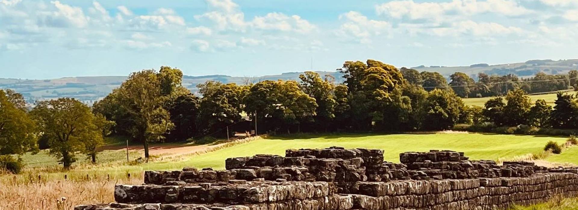 Hadrian's wall with countryside view at back